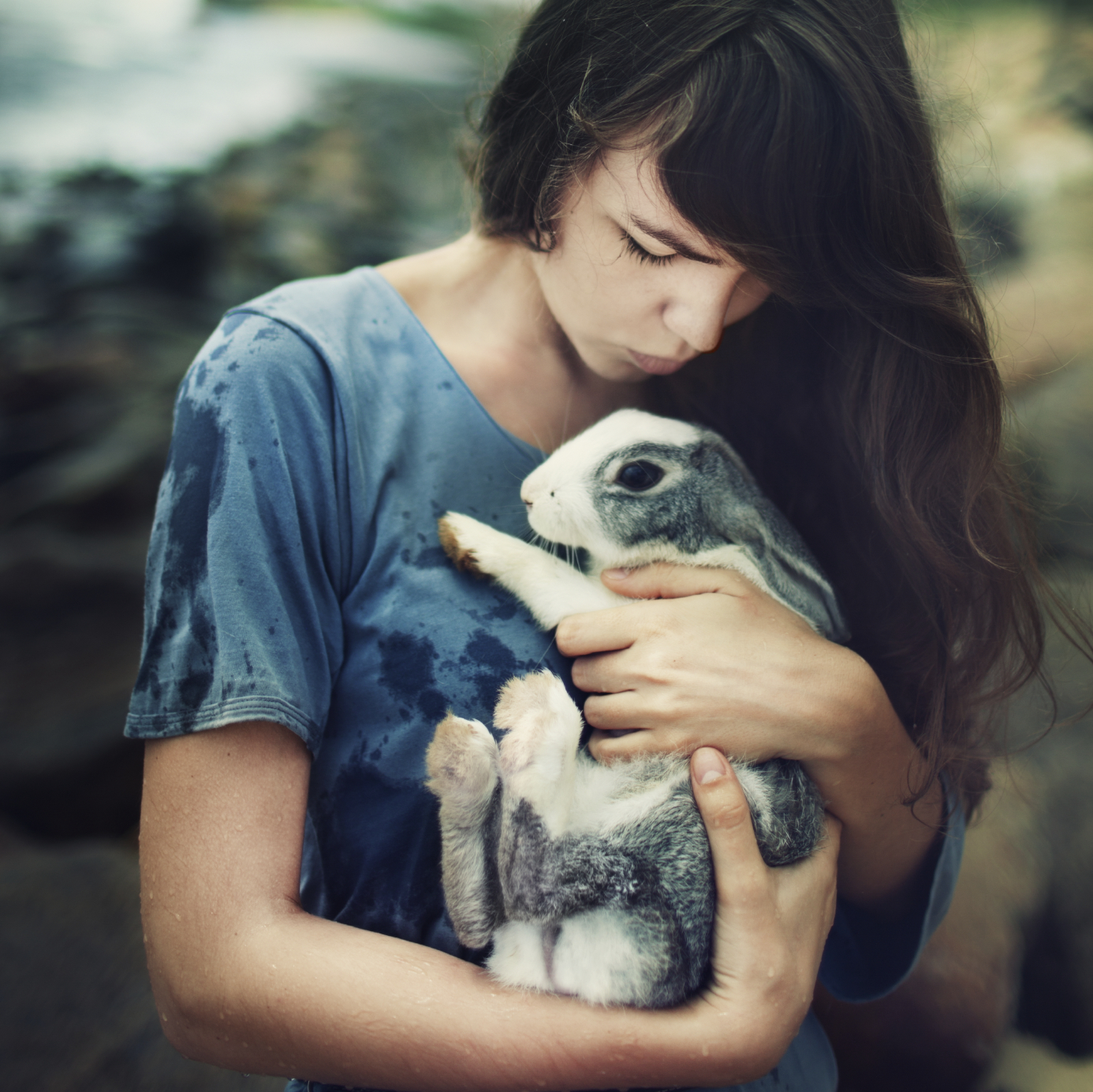 Young-woman-with-rabbit-000019624955_Medium
